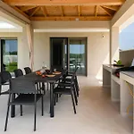 Villa Rhea, *